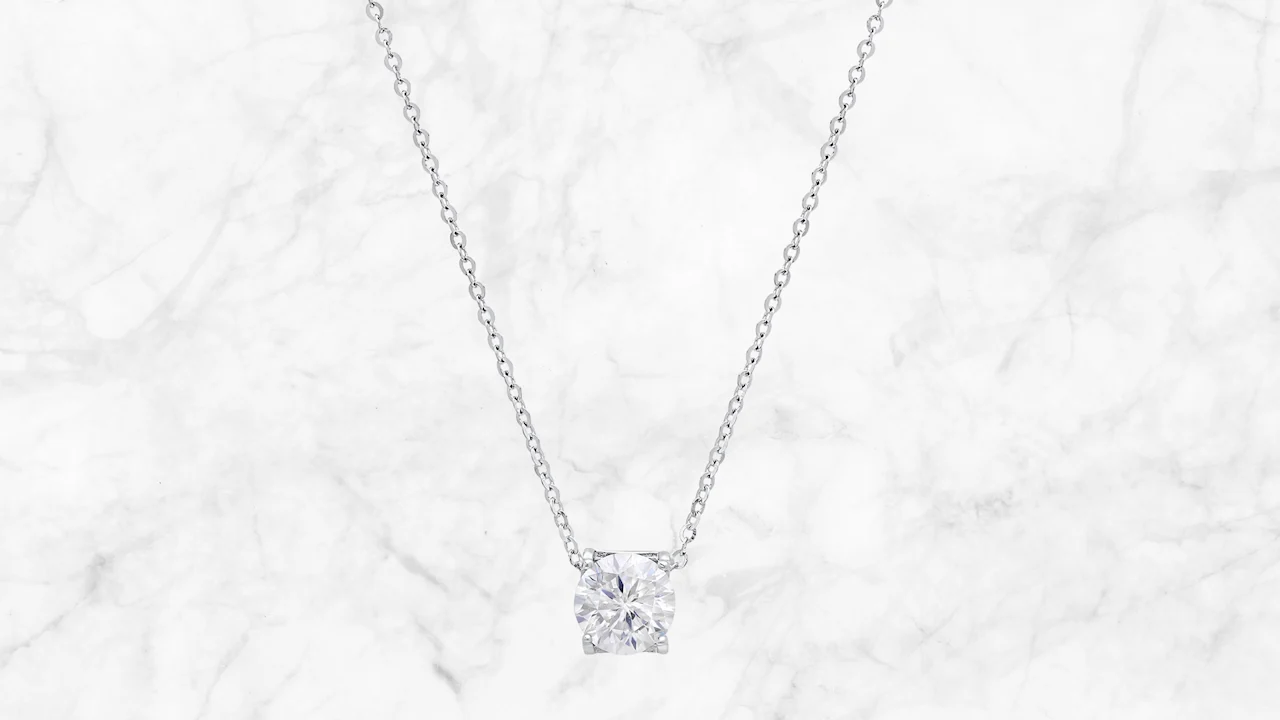 Saffron 1.0 Carat TW Moissanite Pendant Sterling Silver Basket Setting Necklace
