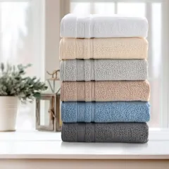 Kathy Ireland 4 or 8-Piece Zero Twist Cotton Plush Bath Towel Set
