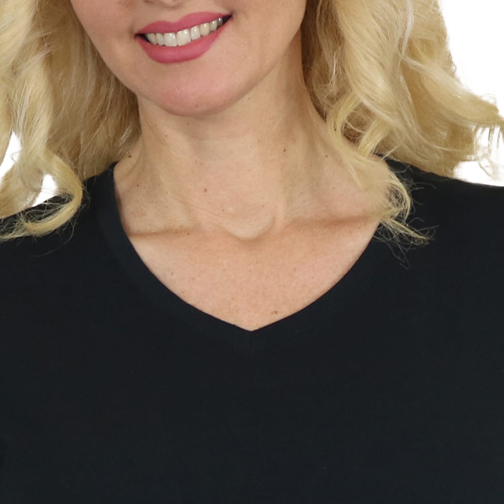 Features a flattering V-neckline and short sleeves for a timeless, versatile look