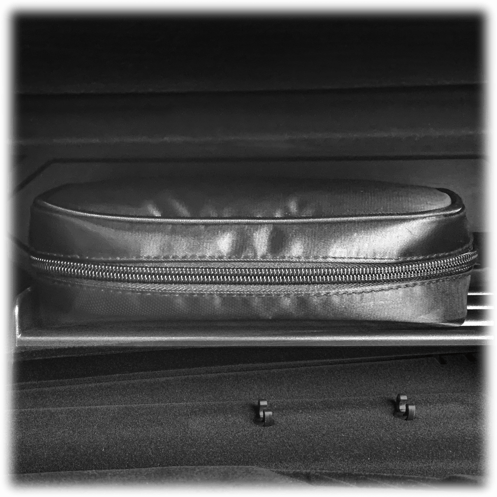 Comes with a carrying case, and fits in any glove box