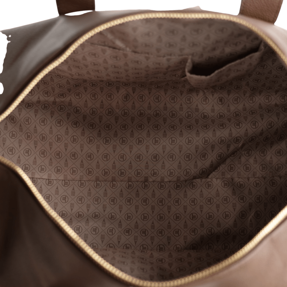 Lined Interior With Slip Pocket Keeps Smaller Items Handy