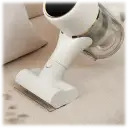 Quickly transforms into a handheld vacuum for cleaning upholstery, car interiors, & hard-to-reach areas