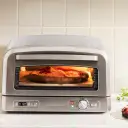 Watch pizzas bake to crispy perfection through the viewing window.