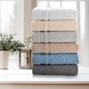 Kathy Ireland 4 or 8-Piece Zero Twist Cotton Plush Bath Towel Set