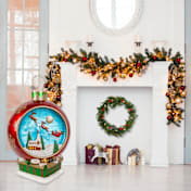 The Giant 34-Inch Santa's Sleigh Ornament With Music and Lights