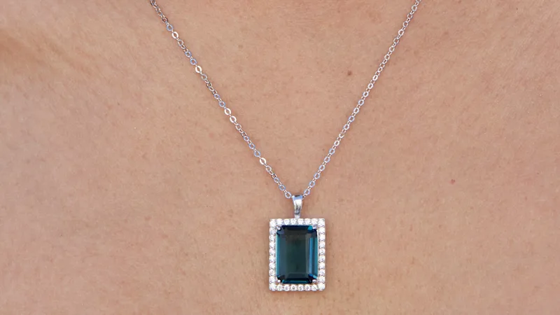 Savvy Cie Emerald Cut London Blue Cubic Zirconia Halo Necklace