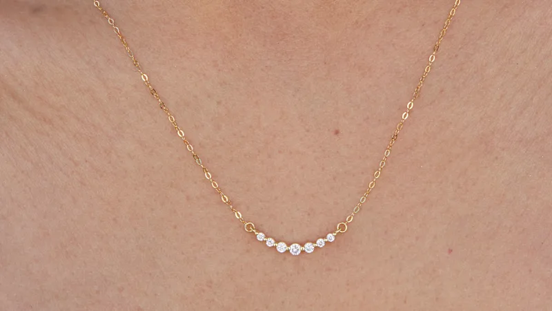 Savvy Cie Graduated CZ Curved Bar necklace