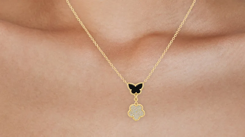 Kenneth Jay Lane Butterfly Pendant Necklace with Pavé Clover Drop