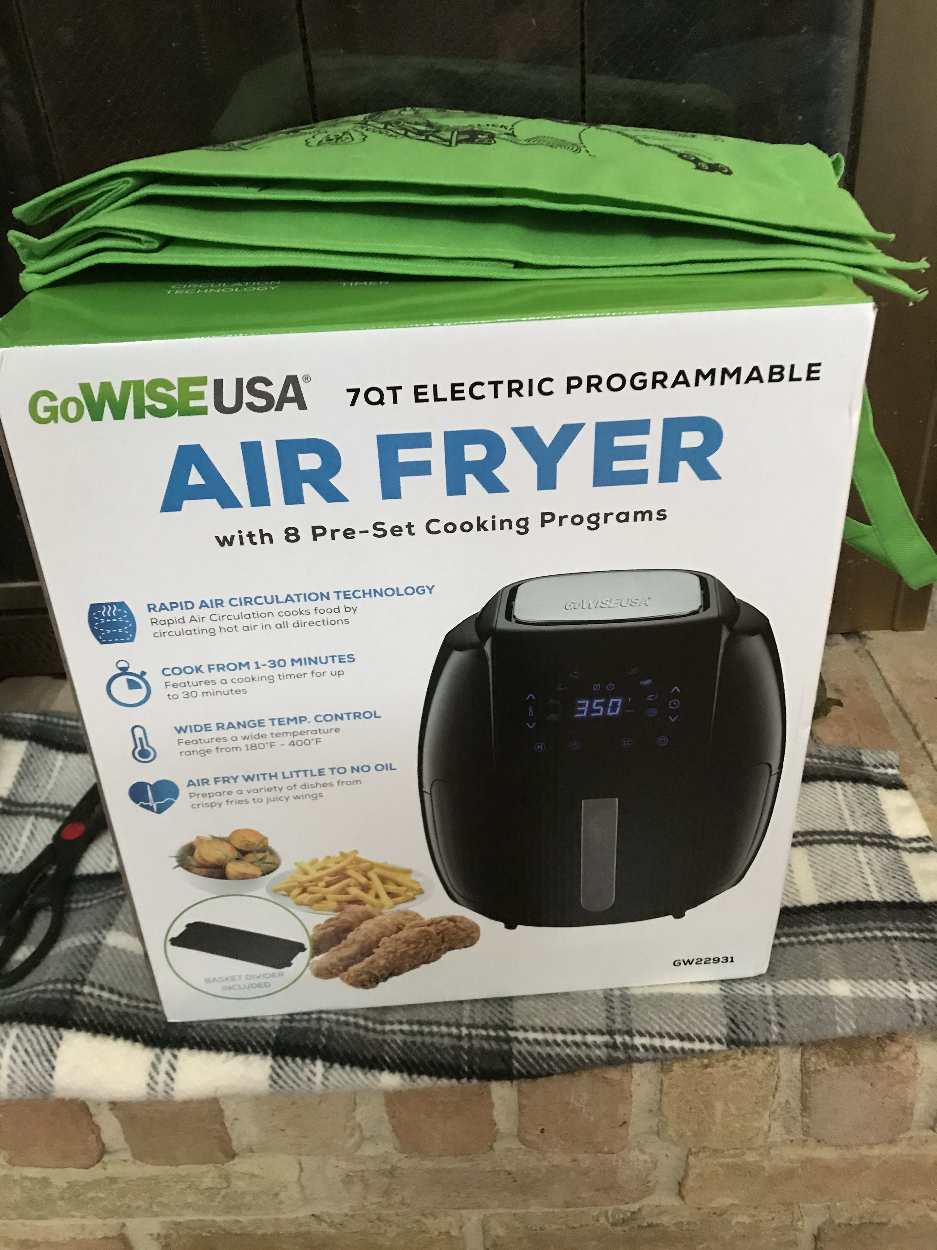 green irk bag atop 7qt air fryer