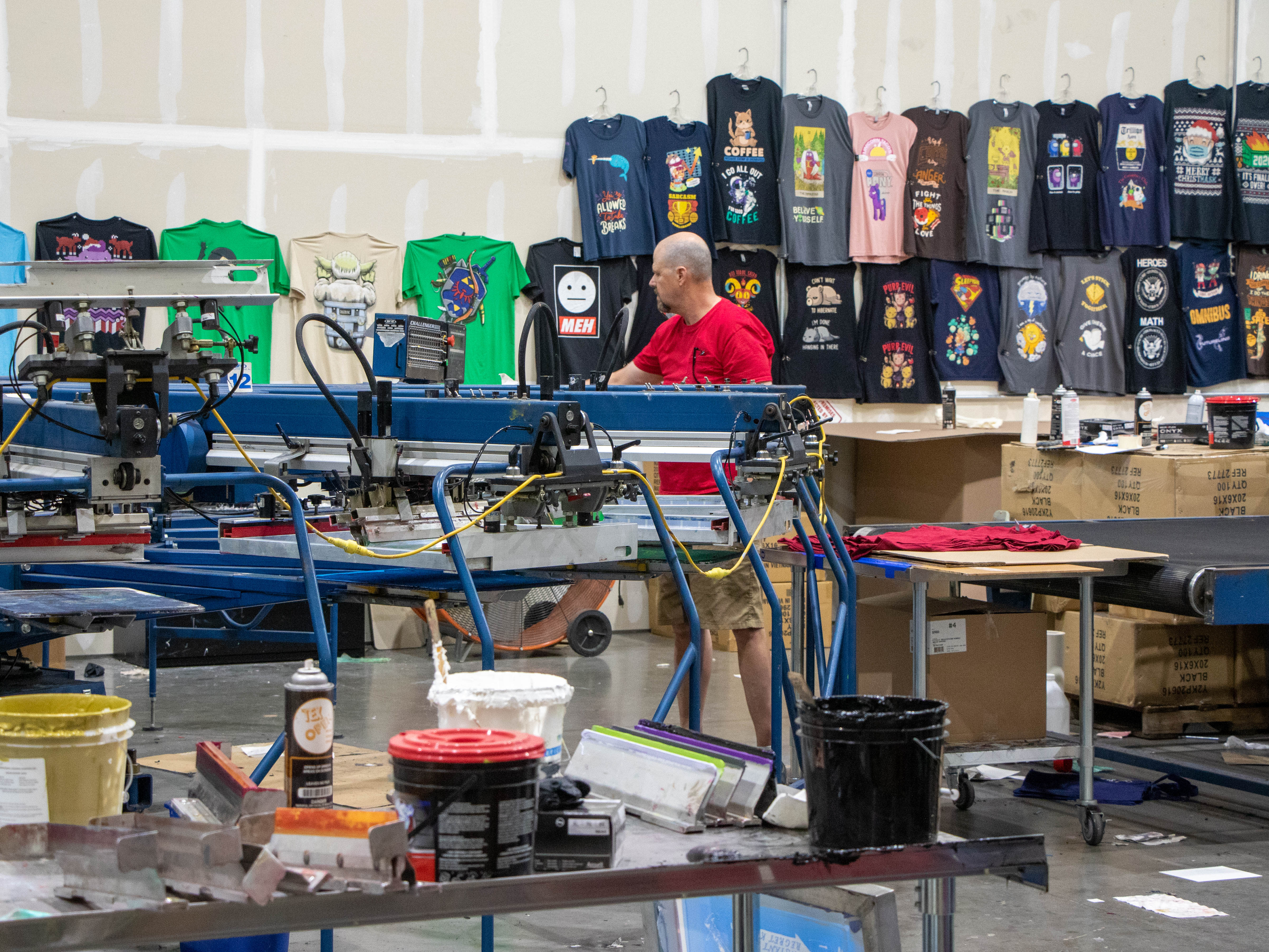 We got to see the cool shirt printing carousel machine