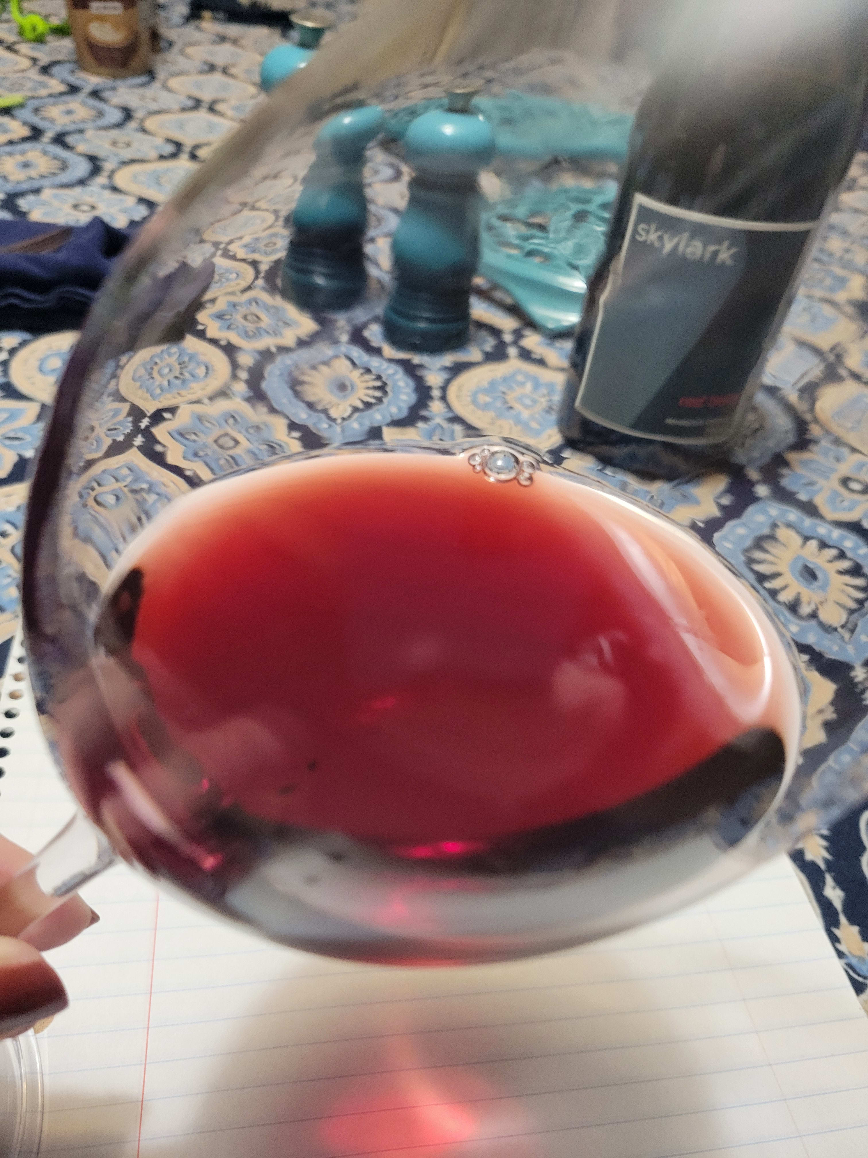 Close up of the red wine in a glass