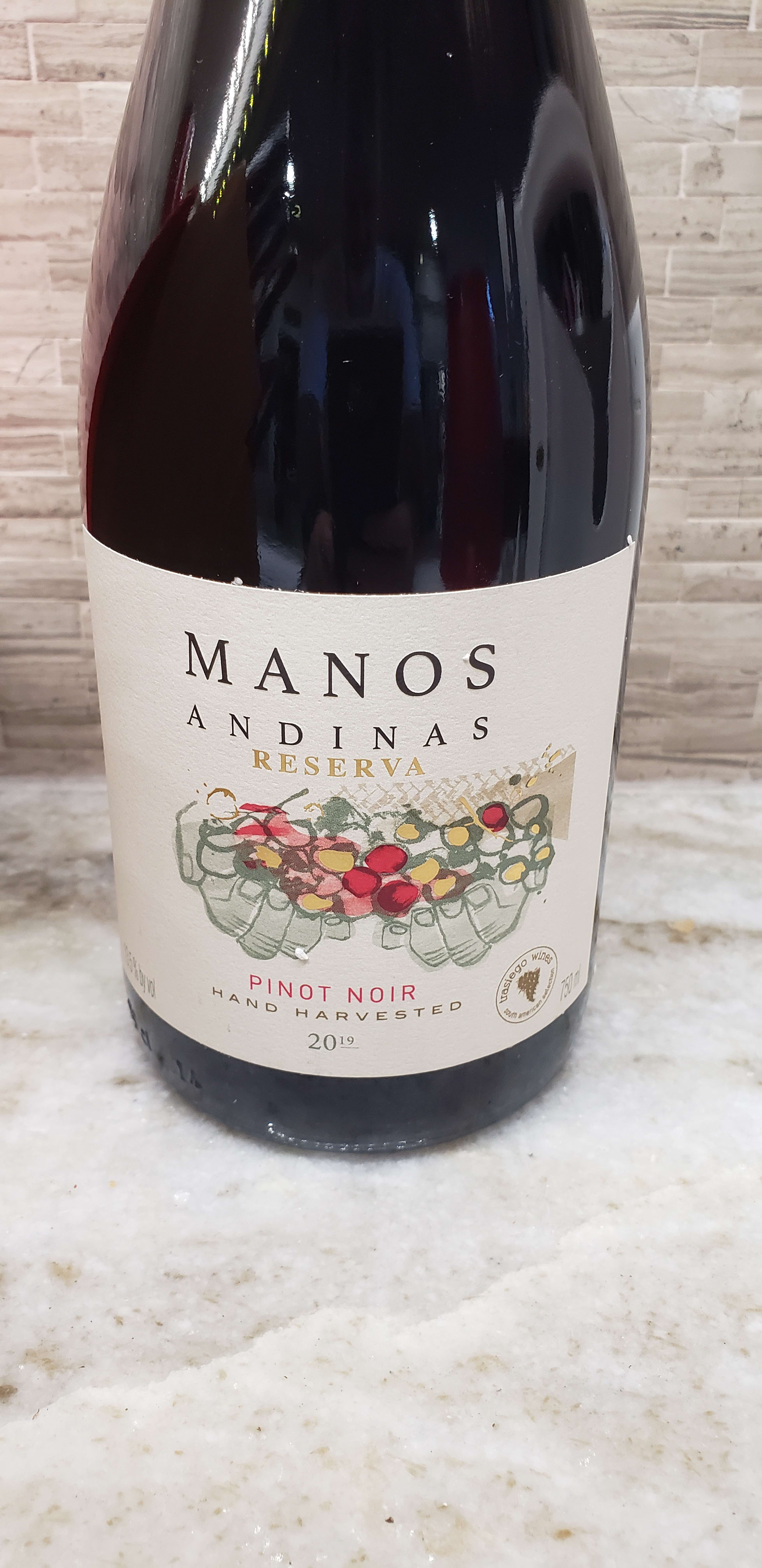 Manos Front