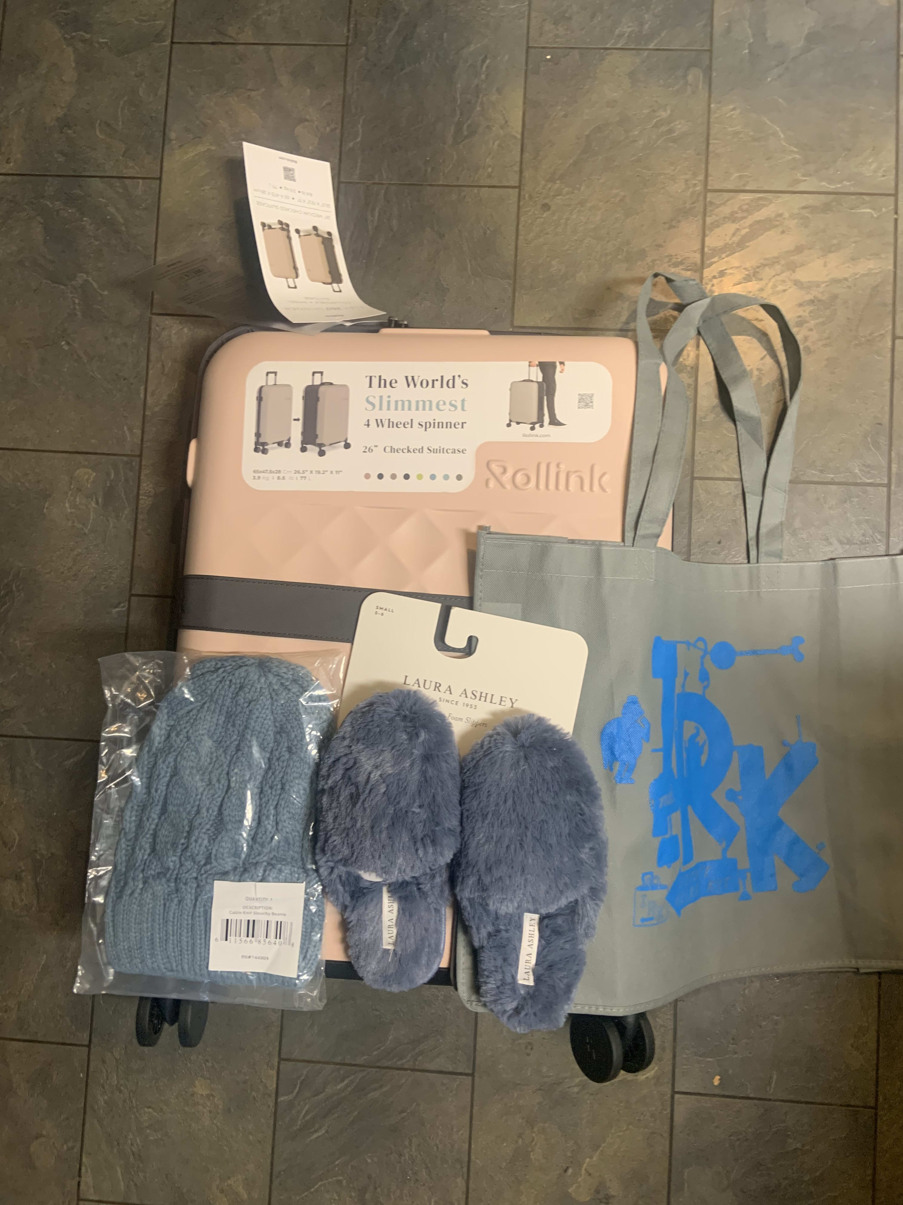 Rollink collapsible suitcase
Size small Laura Ashley memory foam slippers
Cable knit slouchy beanie
Gray IRK bag