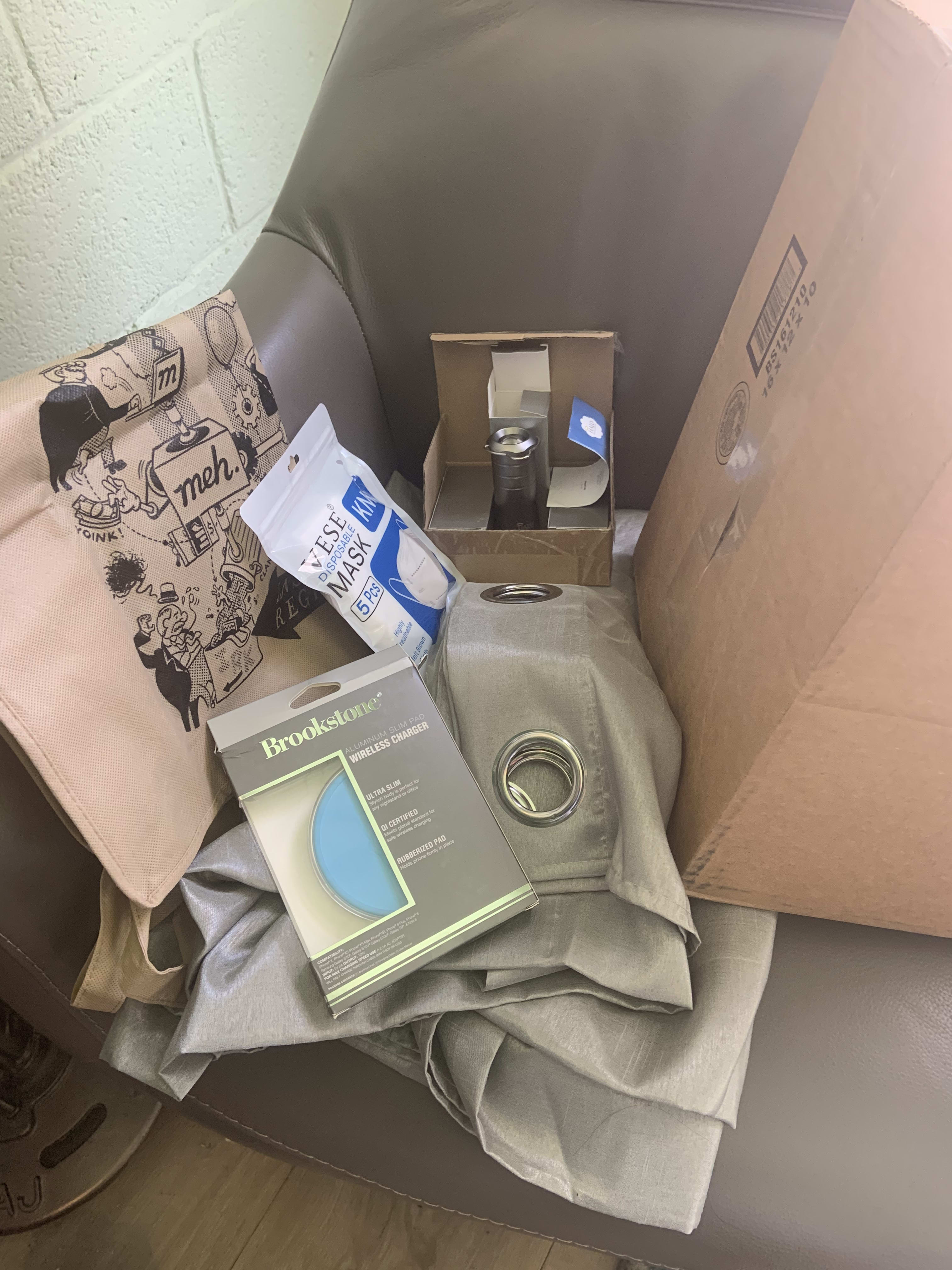 while doing battle for IRK s, an irk has come. It includes:
A chic sac in beige
Face masks in very light beige
Off beige curtains
A three pack of metallic beige Halo flashlight/lanterns
One Brookstone Qi charger, in not-beige
A personalized beige box 