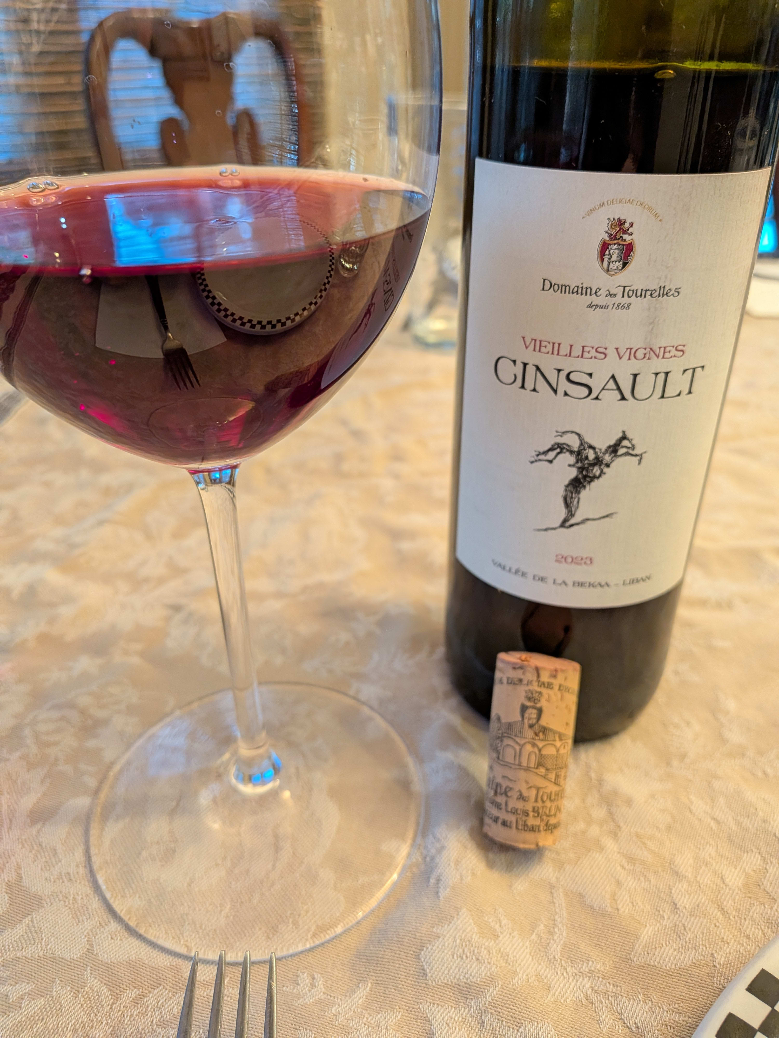 wine in glass with bottle